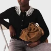 Cardigan with removable beaded collar Cardigan with removable beaded collar