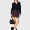 Cardigan with removable details Cardigan with removable details