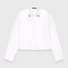 Cropped shirt with jewel detail Cropped shirt with jewel detail