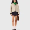 Cropped wool jacket with pleated back Cropped wool jacket with pleated back