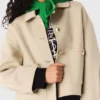 Cropped wool jacket with pleated back Cropped wool jacket with pleated back