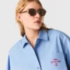 Embroidered shirt with pleated back Embroidered shirt with pleated back