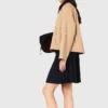 Jacket with removable contrast collar
