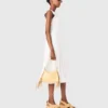 Knit dress with gold jewellery Knit dress with gold jewellery