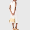 Knit dress with gold jewellery Knit dress with gold jewellery