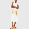 Knit dress with gold jewellery Knit dress with gold jewellery