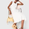 Knit dress with gold jewellery Knit dress with gold jewellery