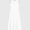 Knit dress with gold jewellery Knit dress with gold jewellery
