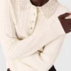 Knit polo shirt with rhinestone collar Knit polo shirt with rhinestone collar