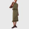 Knit skirt with rhinestone flowers