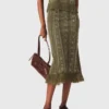 Knit skirt with rhinestone flowers