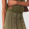 Knit skirt with rhinestone flowers
