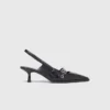 Leather pumps with eyelet strap Leather pumps with eyelet strap