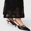 Leather pumps with eyelet strap Leather pumps with eyelet strap