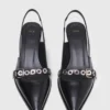 Leather pumps with eyelet strap Leather pumps with eyelet strap