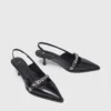 Leather pumps with eyelet strap Leather pumps with eyelet strap