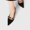 Leather pumps with eyelet strap Leather pumps with eyelet strap