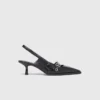 Leather pumps with eyelet strap Leather pumps with eyelet strap