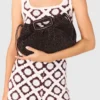 Mipli bouclé effect clutch bag Mipli bouclé effect clutch bag