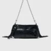 Patent leather Miss M Pouch bag
