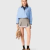 Pleated skirt with poplin details Pleated skirt with poplin details
