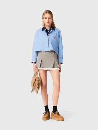 Pleated skirt with poplin details Pleated skirt with poplin details