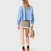 Pleated skirt with poplin details Pleated skirt with poplin details