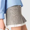Pleated skirt with poplin details Pleated skirt with poplin details