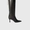 Pointed-toe leather boots