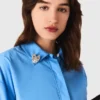 Shirt with removable jewellery Shirt with removable jewellery