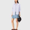 Short pleated denim skirt with strass Short pleated denim skirt with strass