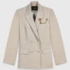 Suit jacket with brooch