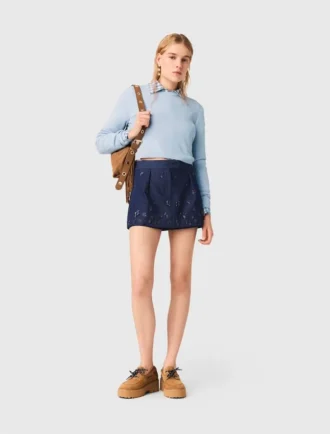 Sweater with jeweled bows on back