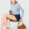 Sweater with jeweled bows on back Sweater with jeweled bows on back