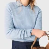 Sweater with jeweled bows on back Sweater with jeweled bows on back