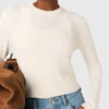 Sweater with jewelled buttons Sweater with jewelled buttons