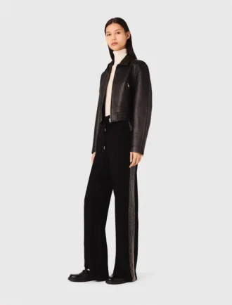 Trousers with rhinestone band