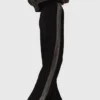 Trousers with rhinestone band Trousers with rhinestone band