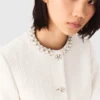Tweed jacket with pearl trim