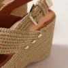 Wedge sandals with raffia effect Wedge sandals with raffia effect