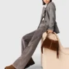 Wide-leg jeans with chain-link belt Wide-leg jeans with chain-link belt
